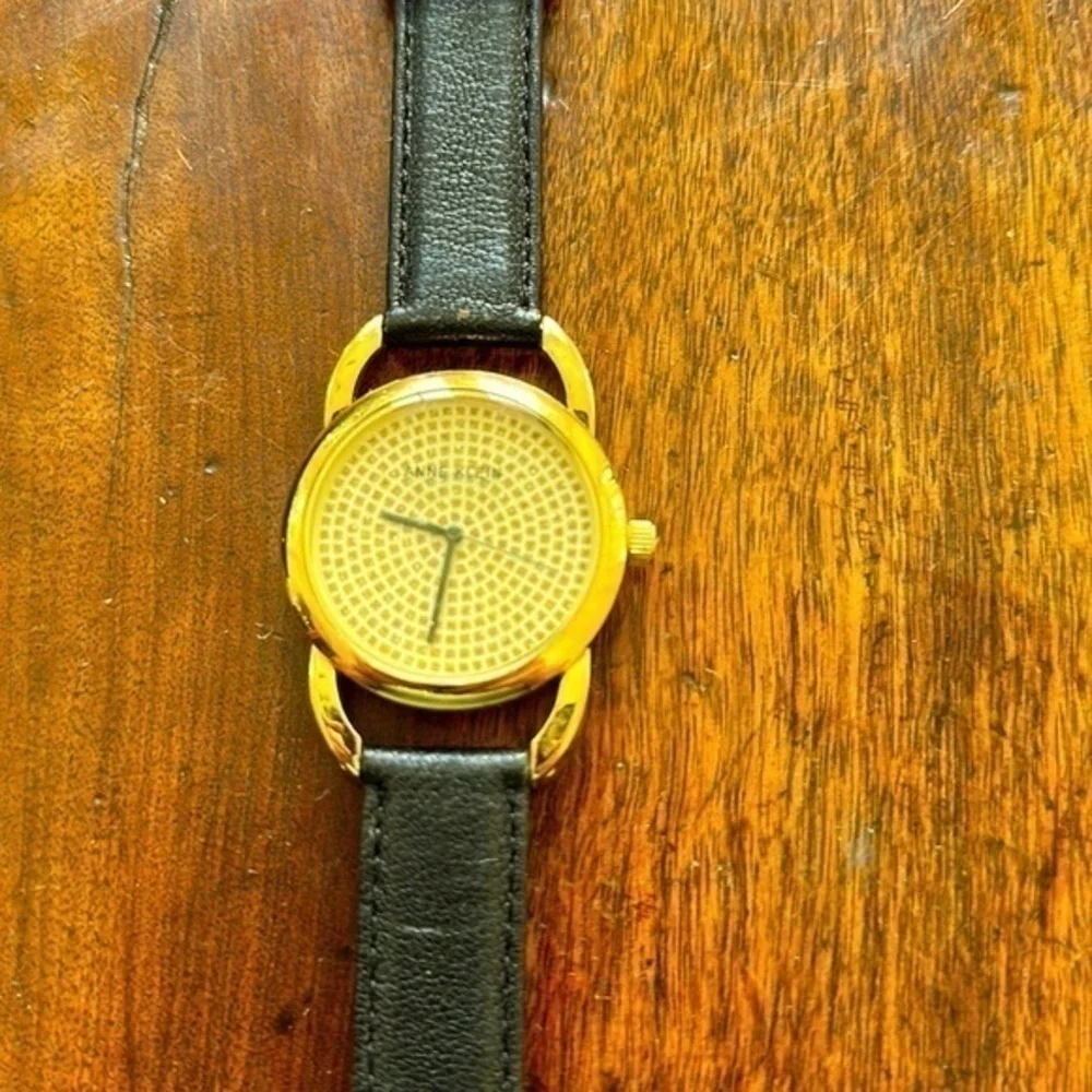 Women’s Anne Klein gold and black fashion quartz watch